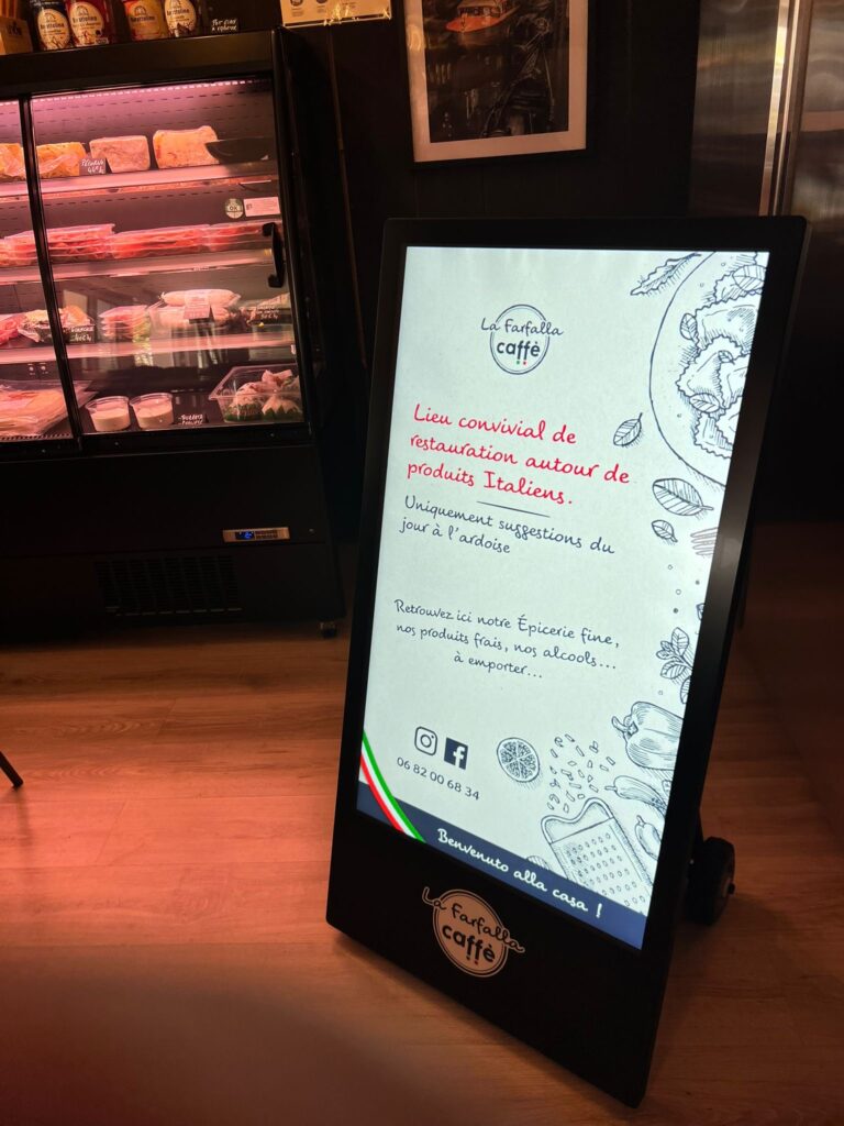 Stop trottoir numérique installé sur une rue commerçante